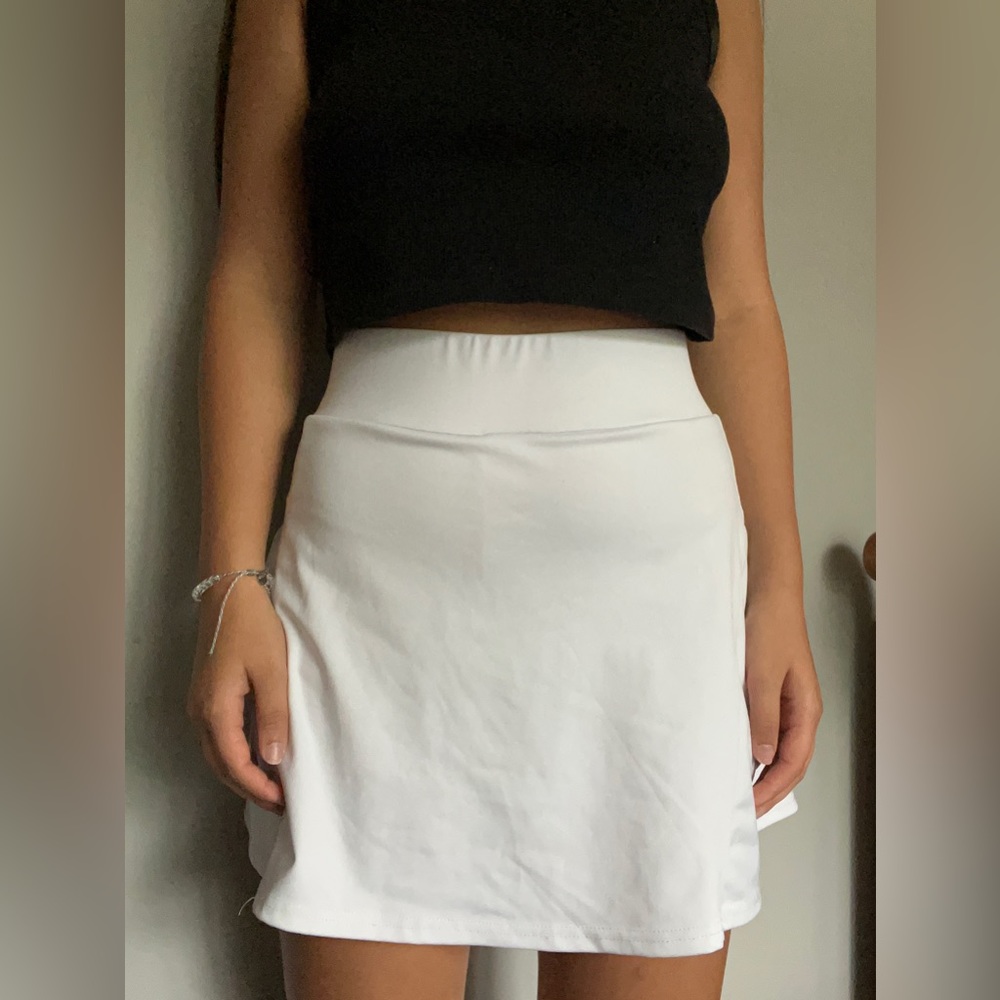 white pleaded tennis skirt